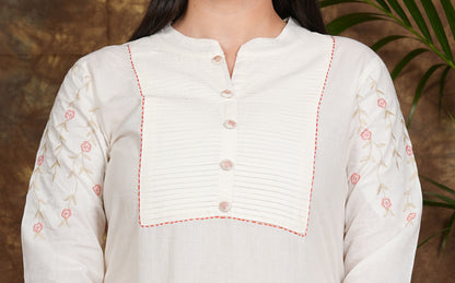 "Elegant Essence: Embroidered White Kurta & Pant Set"